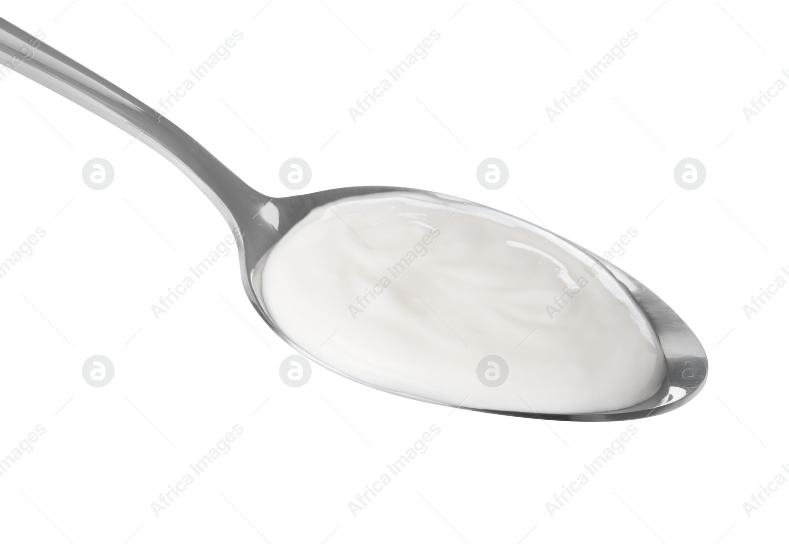 Photo of Spoon with delicious organic yogurt isolated on white