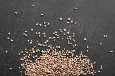 Raw radish seeds on grey background, flat lay. Vegetable planting