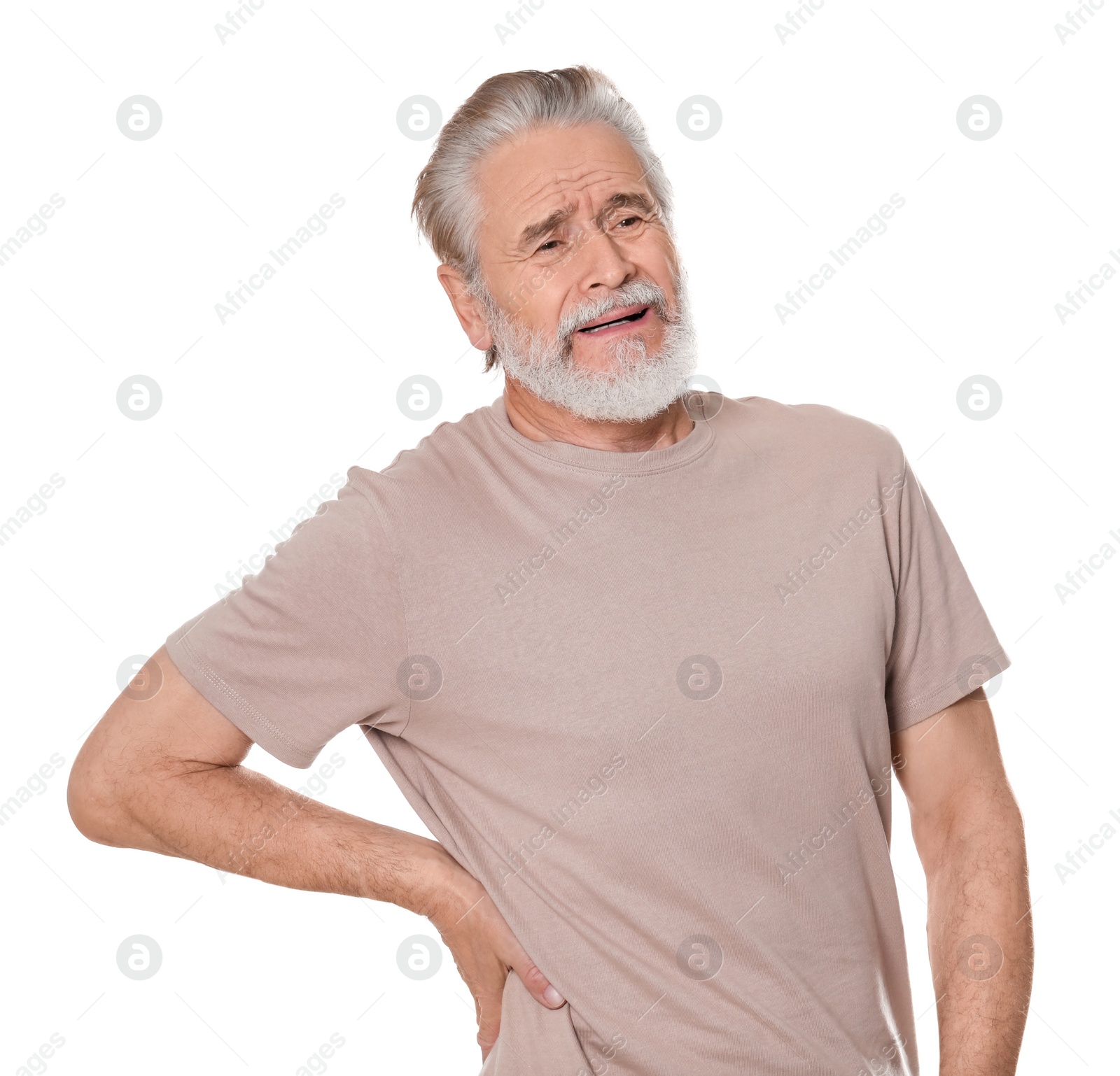 Photo of Senior man suffering from pain in back on white background. Arthritis symptoms