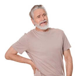 Senior man suffering from pain in back on white background. Arthritis symptoms