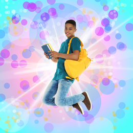 Image of African-American teenager jumping on colorful background. School holidays