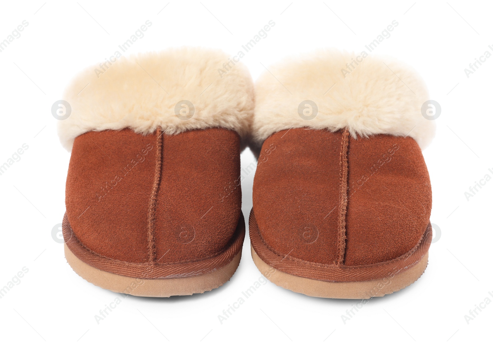 Photo of Pair of soft slippers with fur isolated on white