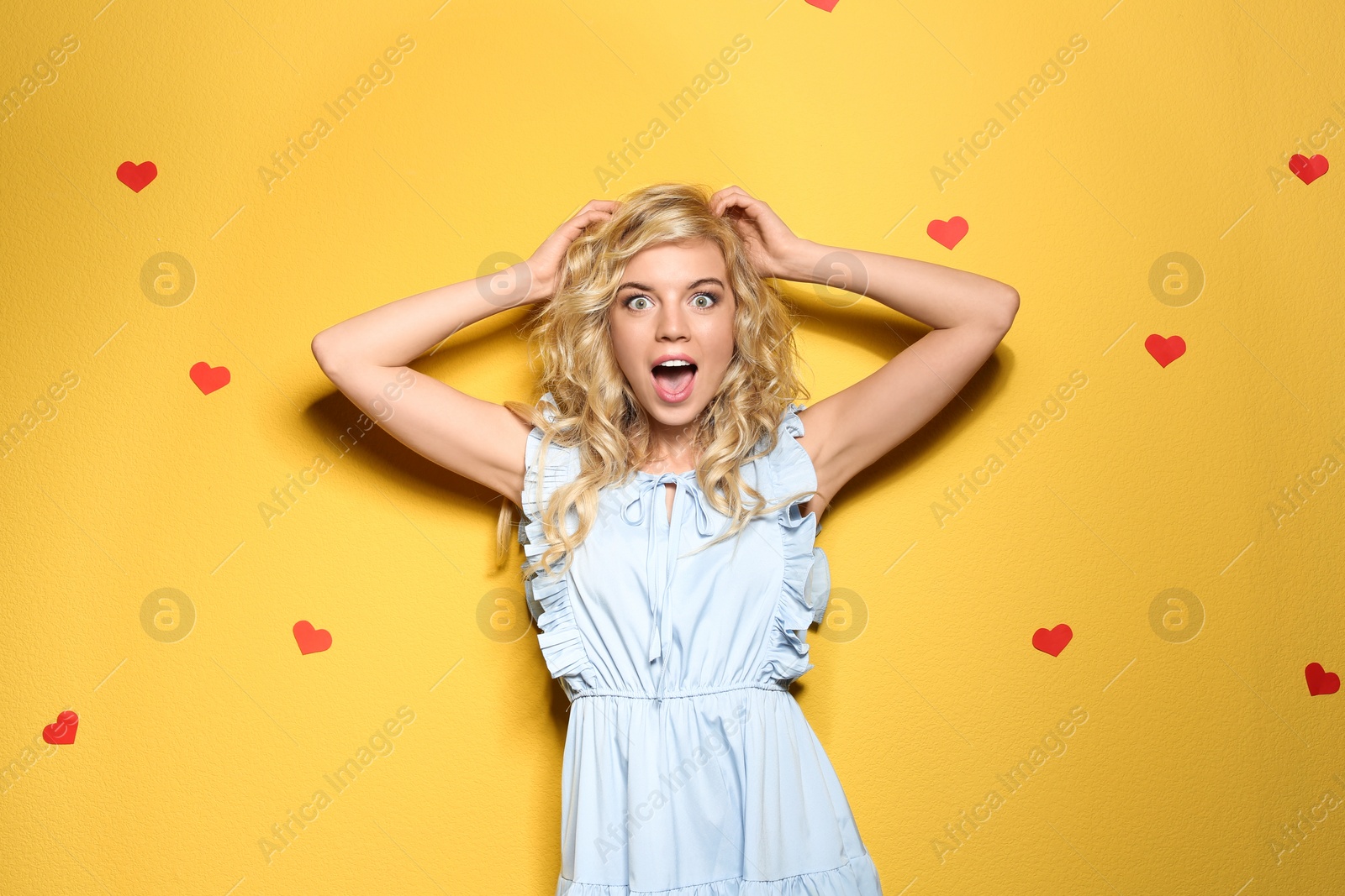 Photo of Emotional stylish young woman on color background