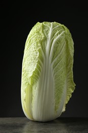 Photo of Fresh ripe Chinese cabbage on grey table