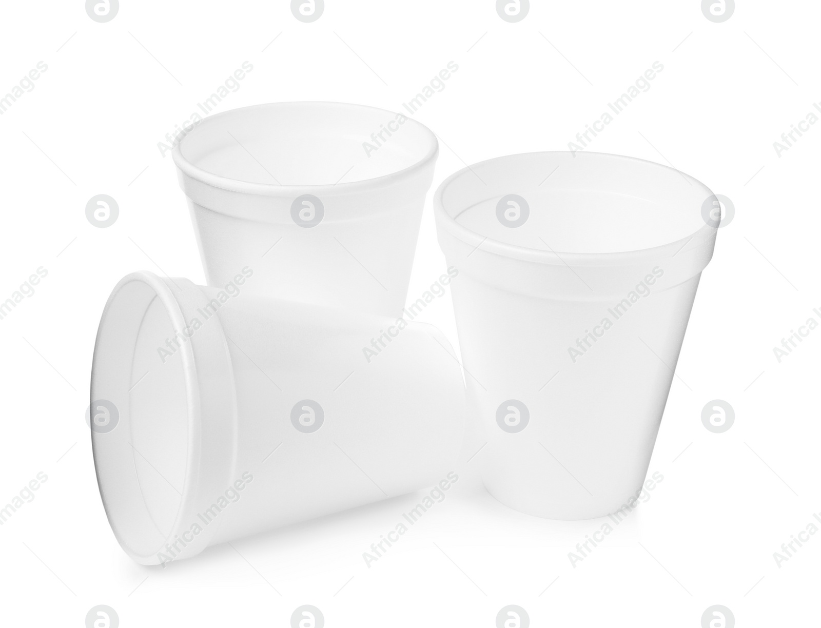 Photo of Three clean styrofoam cups on white background