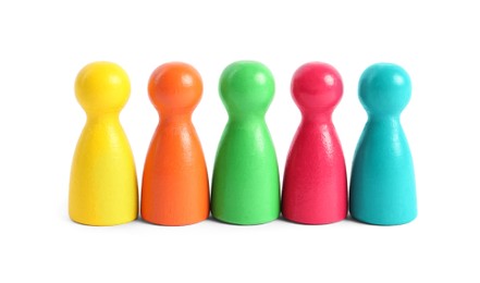 Photo of Colorful pawns on white background. Social inclusion concept