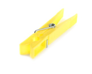 Photo of Bright yellow plastic clothespin isolated on white