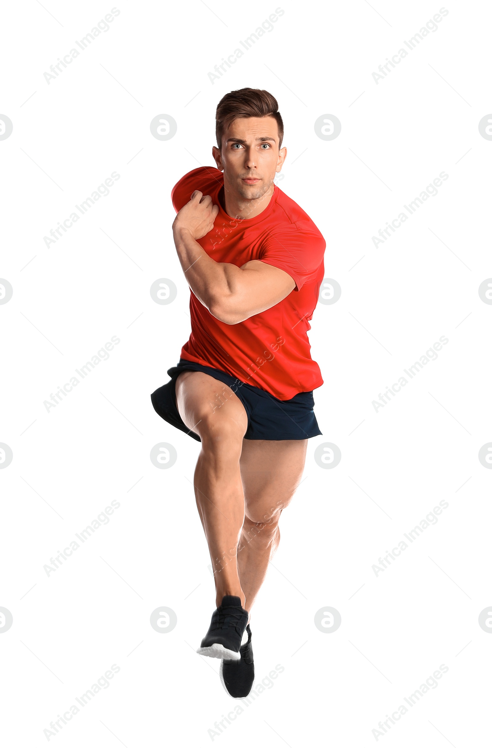 Photo of Sporty young man running on white background