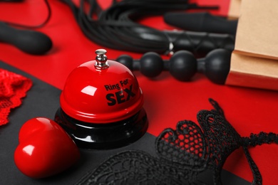 Photo of Set of different sex toys on color background