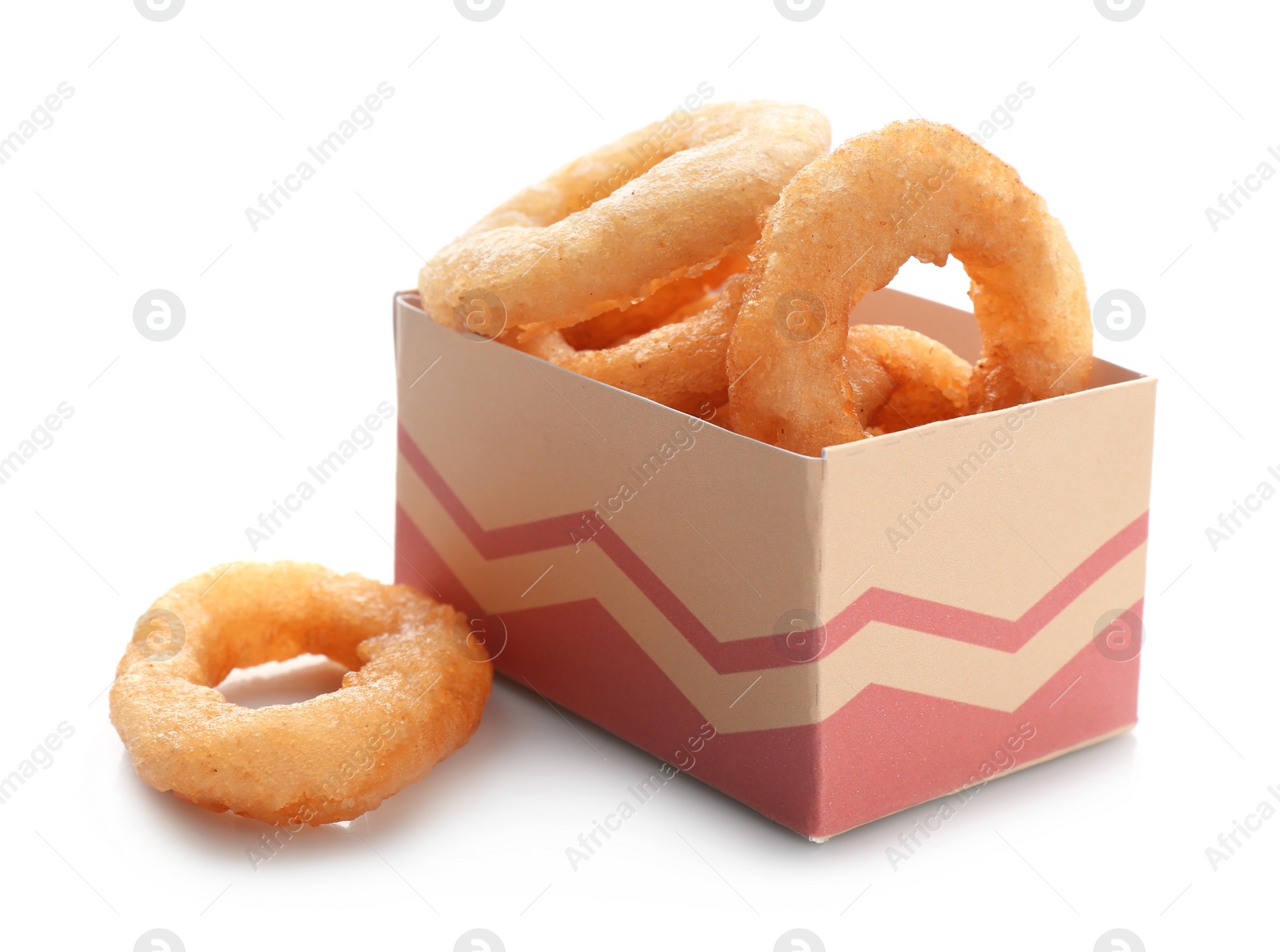 Photo of Box with fried onion rings on white background