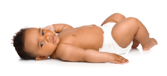 Photo of Adorable African-American baby in diaper on white background