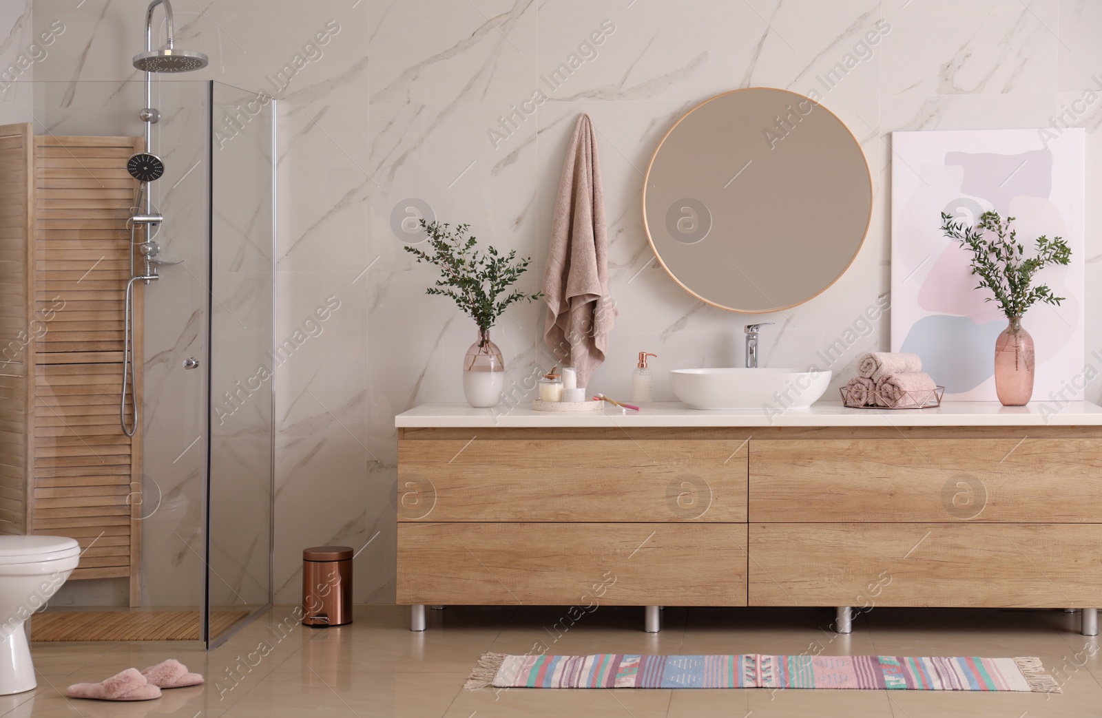 Photo of Modern bathroom interior with stylish mirror and vessel sink