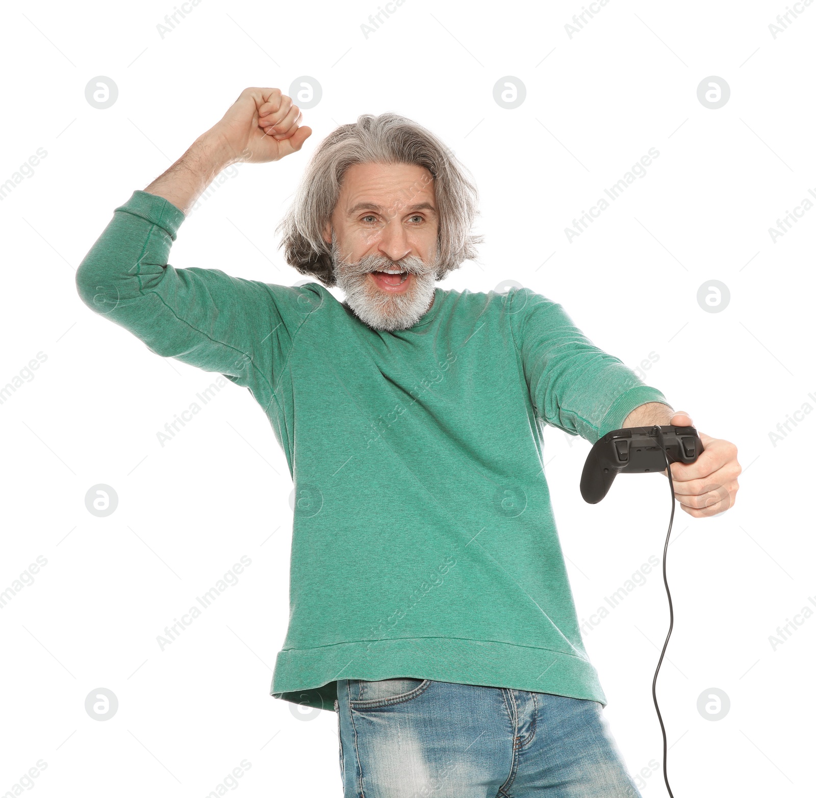 Photo of Emotional mature man playing video games with controller isolated on white