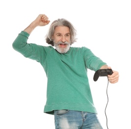 Emotional mature man playing video games with controller isolated on white