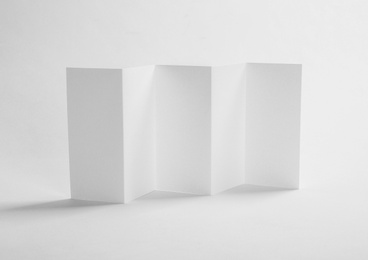 Photo of Blank brochure on white background. Mock up for design