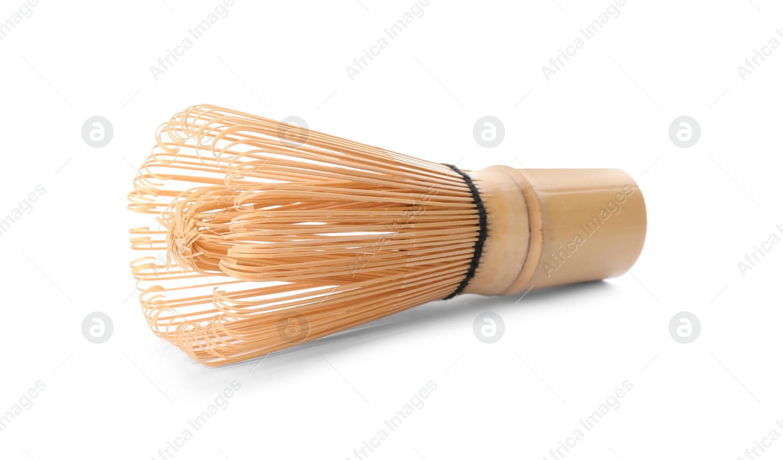 Photo of Tea whisk made of bamboo on white background