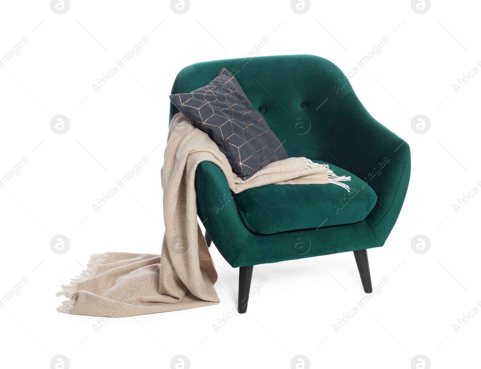 Photo of One green armchair with pillow and blanket isolated on white