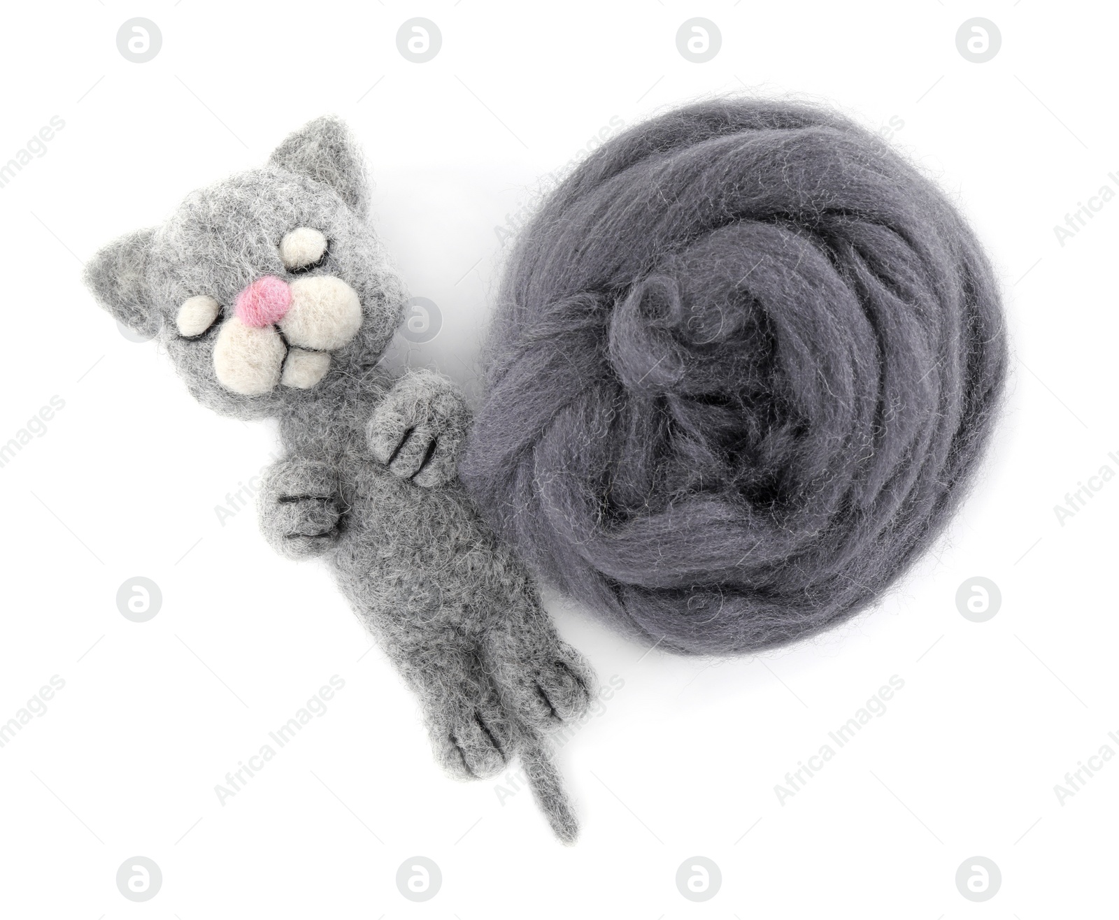 Photo of Needle felted cat and wool isolated on white, top view