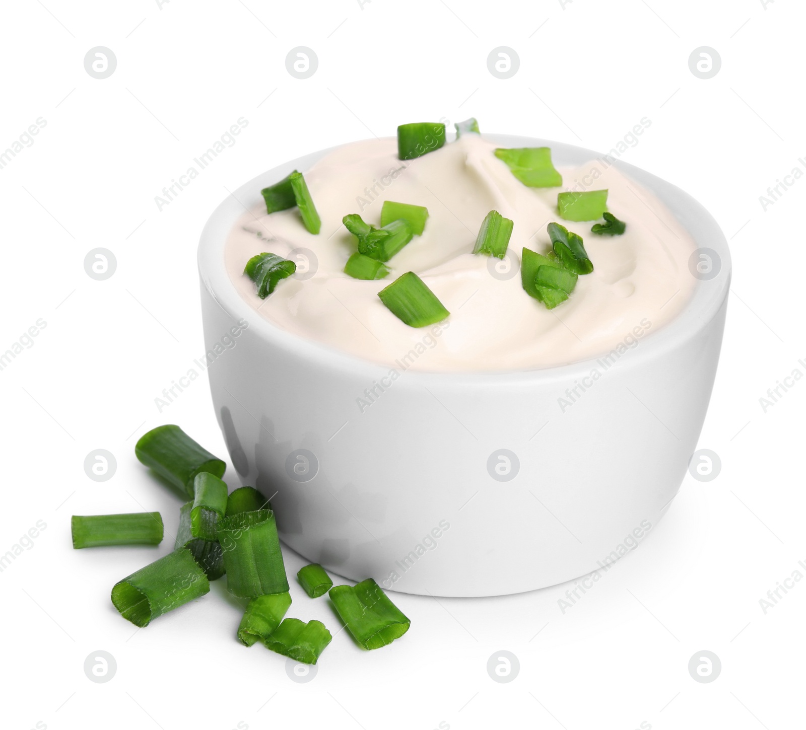 Photo of Fresh sour cream with onion on white background