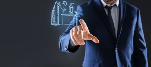 Image of Real estate agent touching house illustration on virtual screen against dark background, closeup. Banner design 