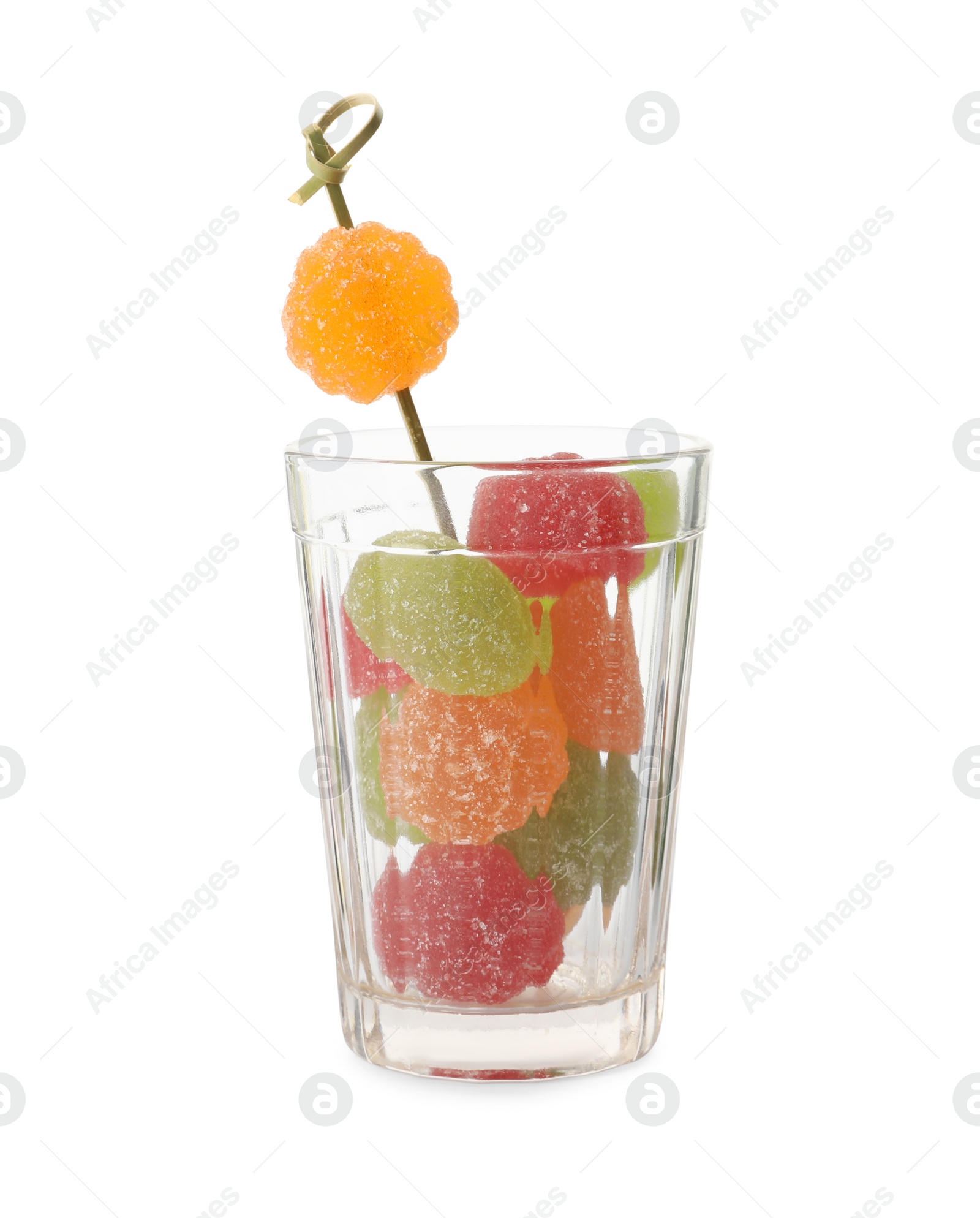 Photo of Delicious gummy candies in glass on white background