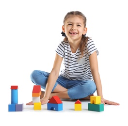 Photo of Cute child playing with colorful blocks on white background