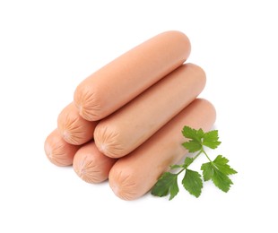 Many delicious boiled sausages and parsley on white background