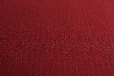 Photo of Texture of beautiful red fabric as background, closeup