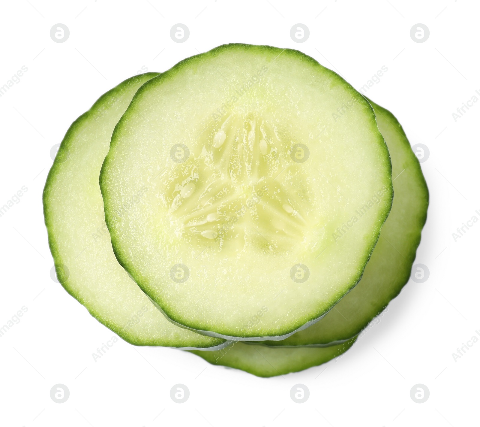 Photo of Stack of fresh cut cucumber isolated on white, top view