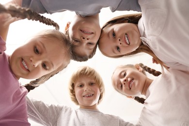 Group of cute little children indoors, bottom view