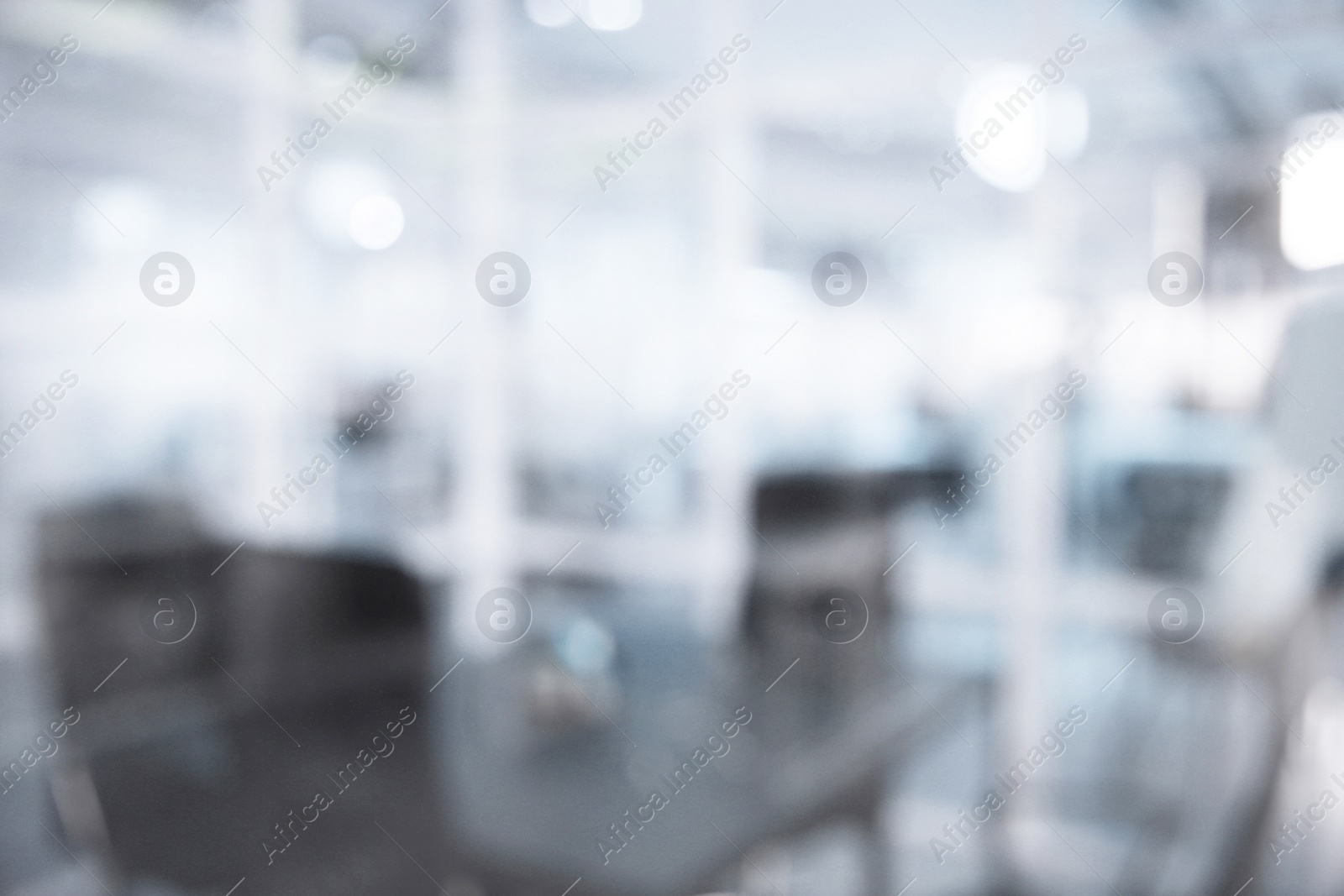 Image of Office interior. Blurred view of comfortable workspace