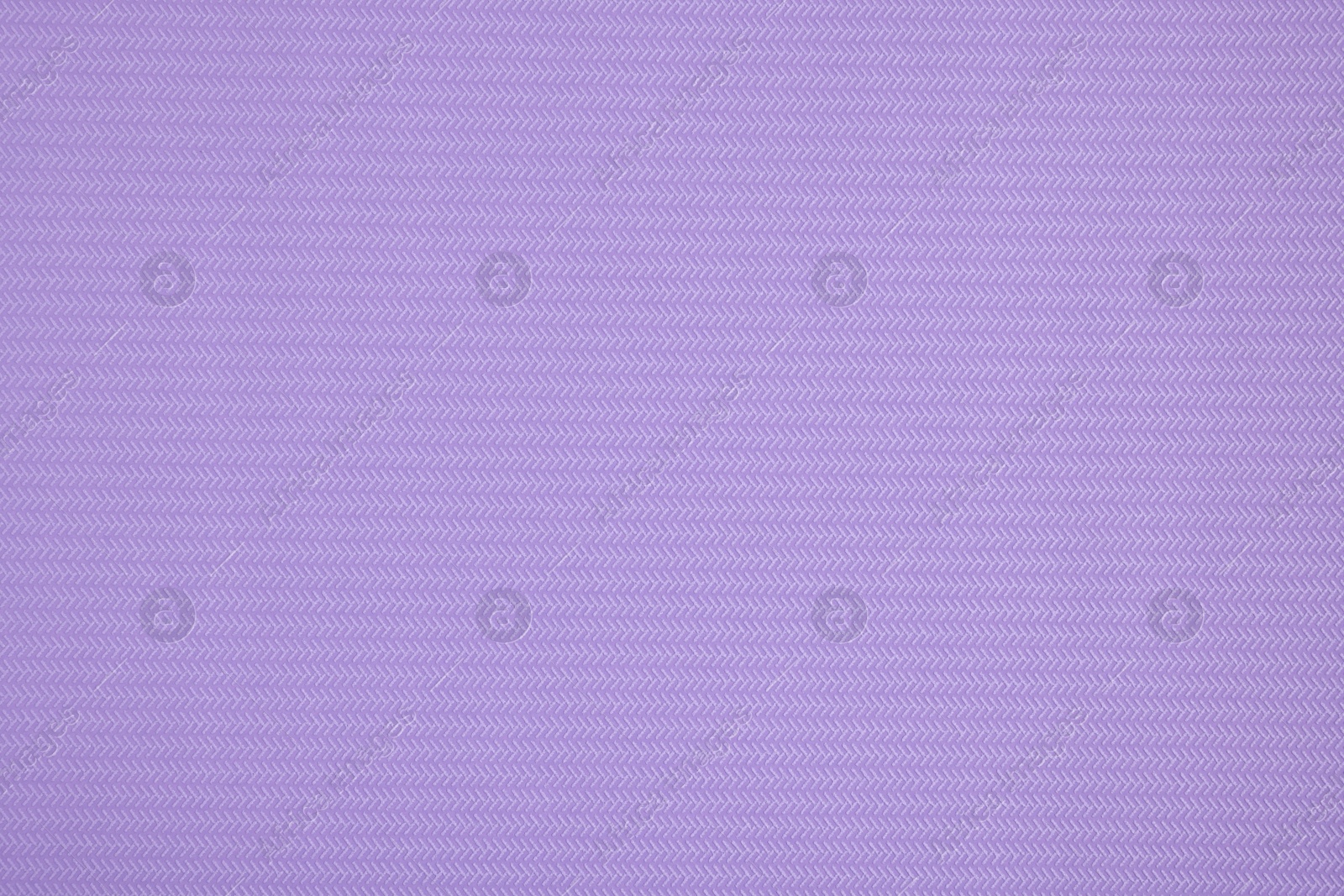 Photo of Stylish violet wallpaper as background, closeup view