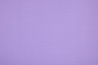 Stylish violet wallpaper as background, closeup view