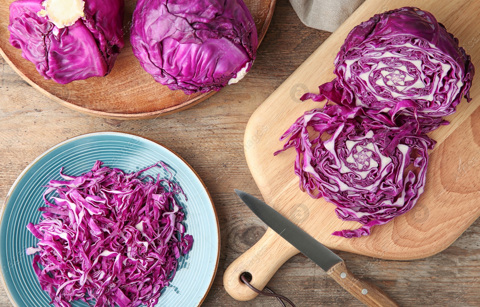 Photo of Flat lay composition with red cabbage on wooden table