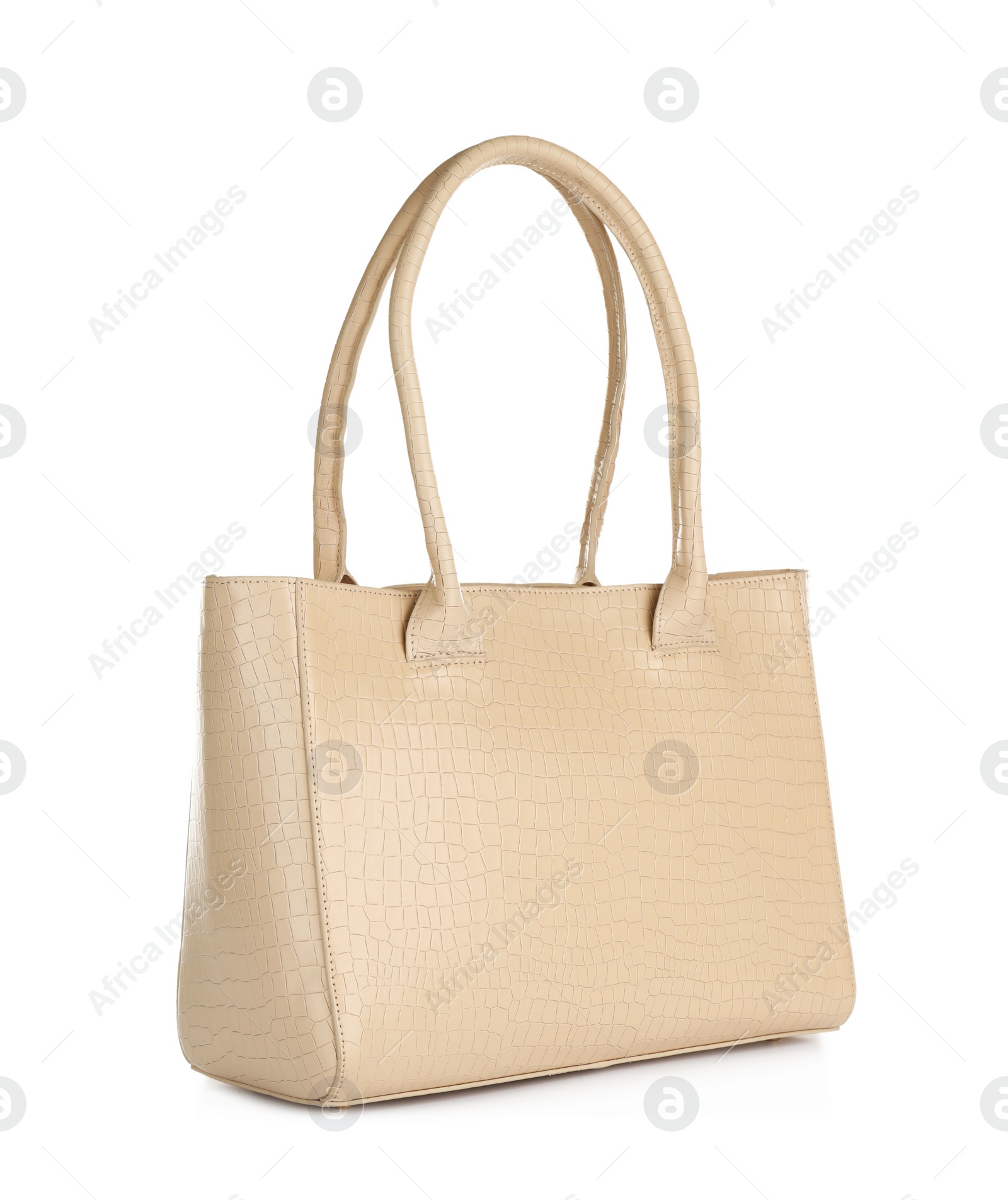 Photo of Beige women's leather bag isolated on white