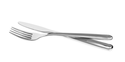 Knife and fork isolated on white. Stylish shiny cutlery set