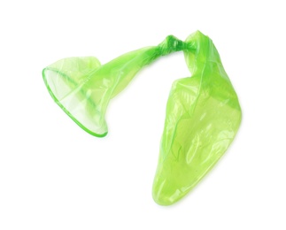 Green used condom on white background. Safe sex concept