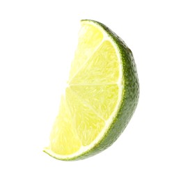 Slice of fresh green ripe lime isolated on white