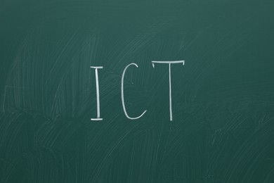 Abbreviation ICT written with chalk on green board