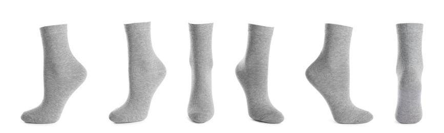 Image of Set with light grey socks on white background. Banner design