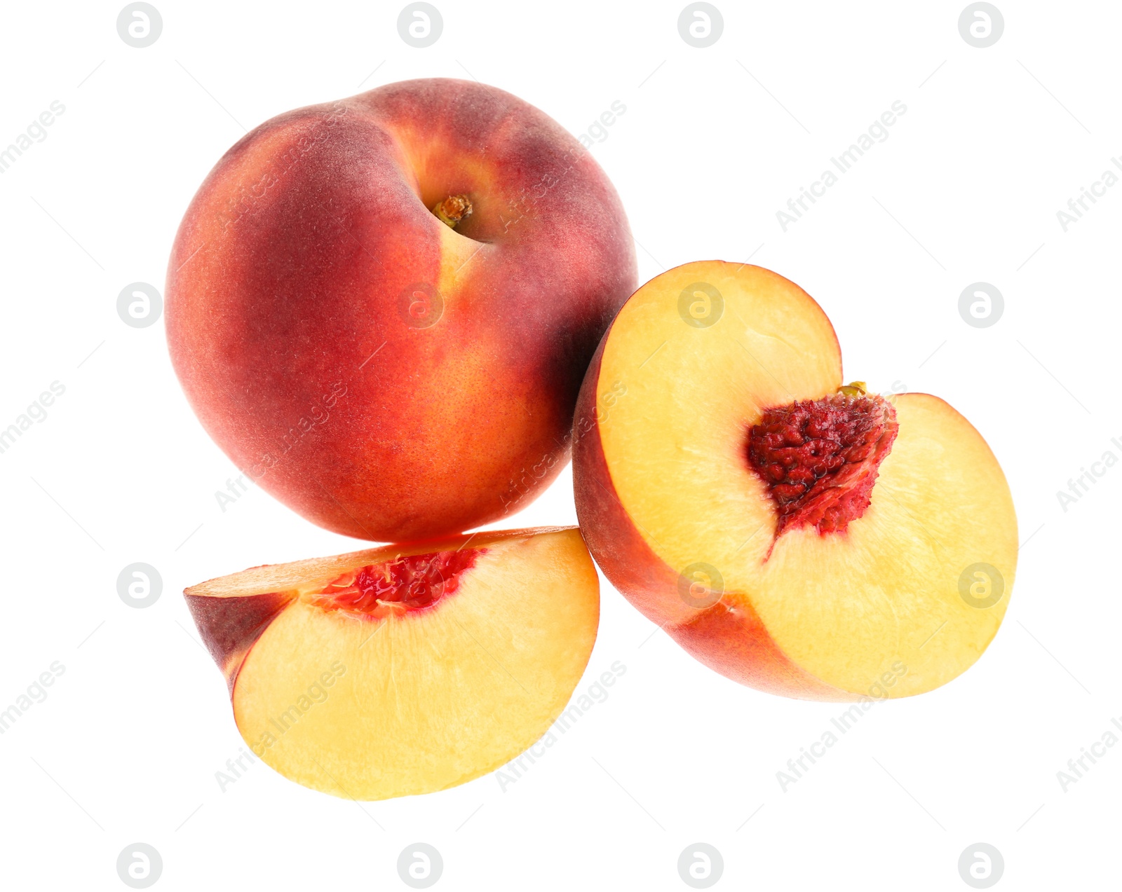 Photo of Whole and cut ripe peaches isolated on white