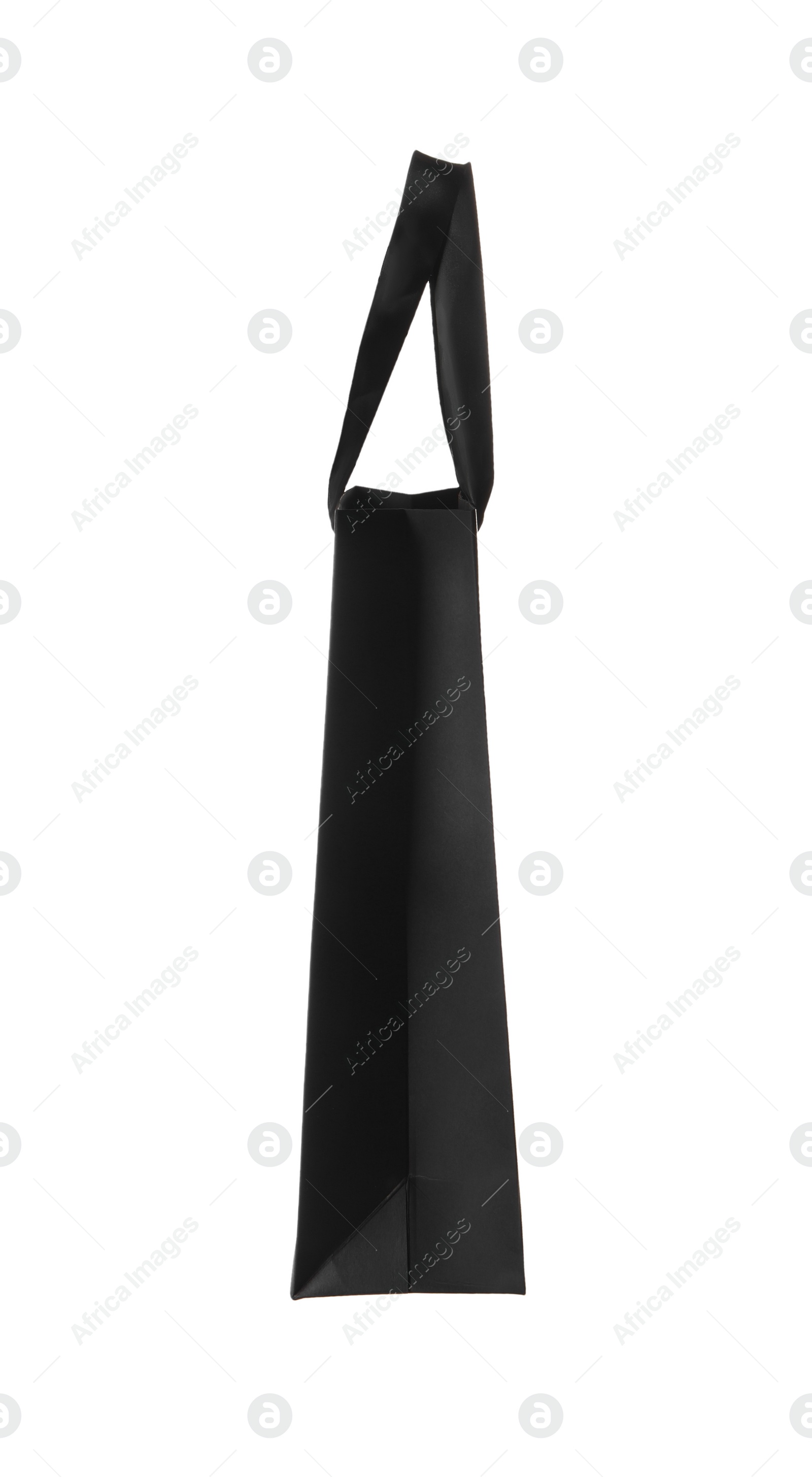 Photo of One black paper bag isolated on white