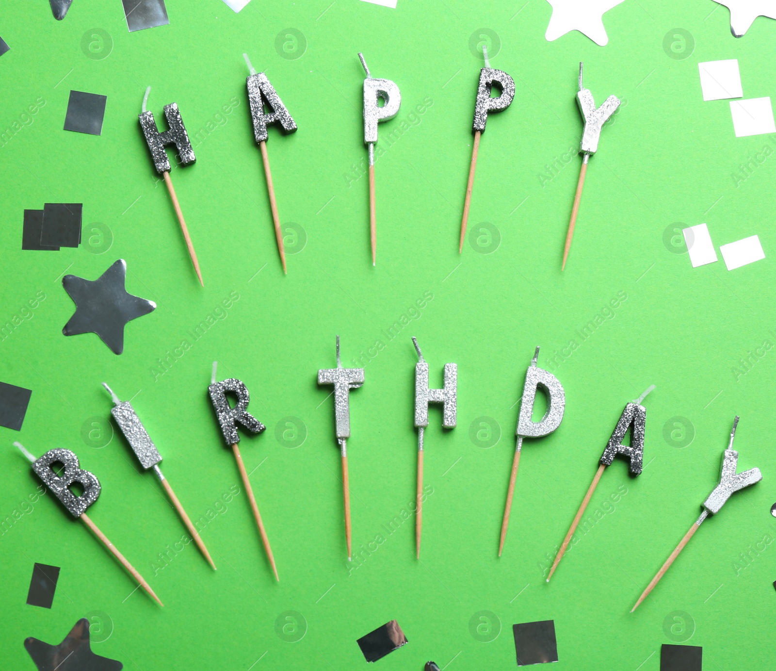 Photo of Flat lay composition with birthday candles on color background