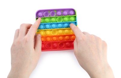 Photo of Woman using pop it fidget toy on white background, closeup