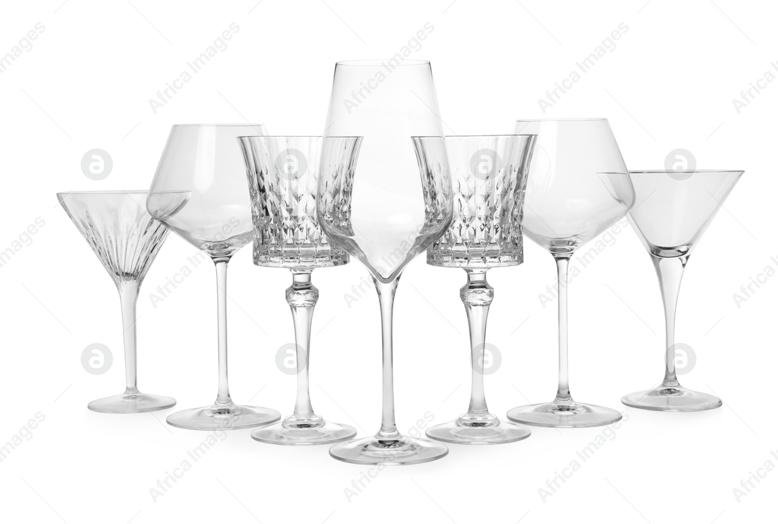 Photo of Elegant martini and wine empty glasses isolated on white