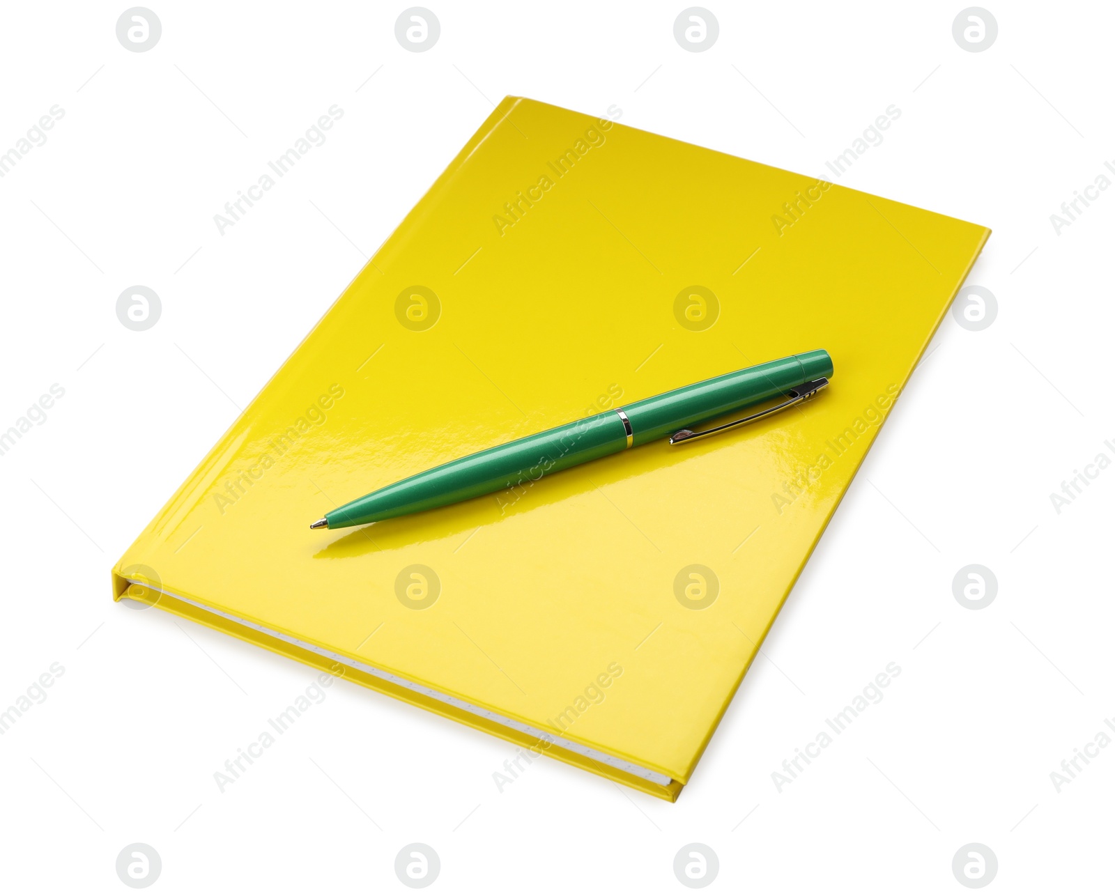 Photo of New yellow planner and pen isolated on white