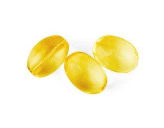 Vitamin capsules isolated on white, top view. Health supplements