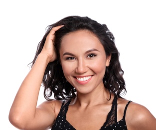 Happy young woman in casual outfit on white background