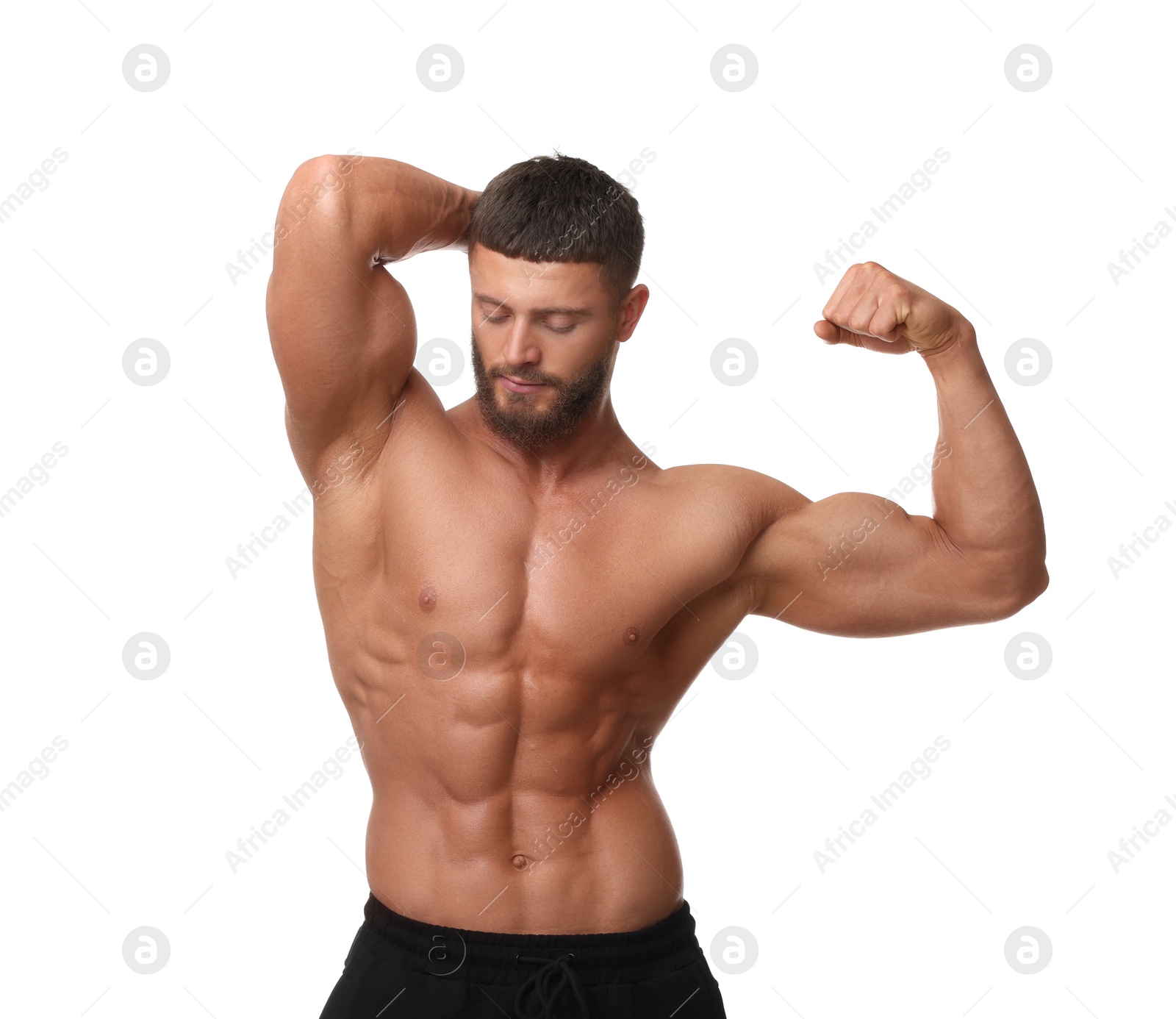 Photo of Young bodybuilder with muscular body on white background