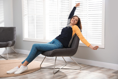 Young woman relaxing at home. Peaceful rest